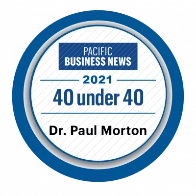 Pacific Business News 40 Under 40, Class of 2021 badge naming Dr. Paul Morton