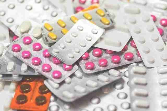 Assorted blister packs of pills representing the medications prescribed after joint replacement surgery.