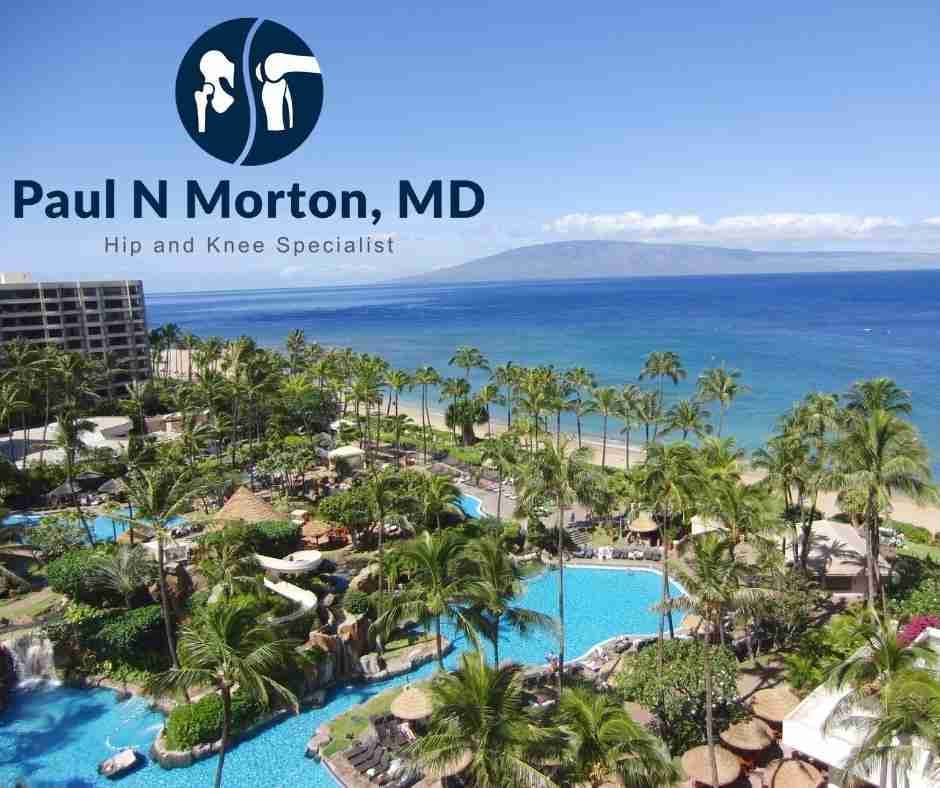 Aerial view of a Ka'anapali beachfront resort on Maui, a destination setting for fly-in joint replacement patients.